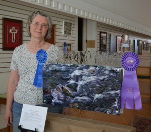 Pareidolia: Breaking the Surface, subtitled Dog Paddling Past Mansfield.